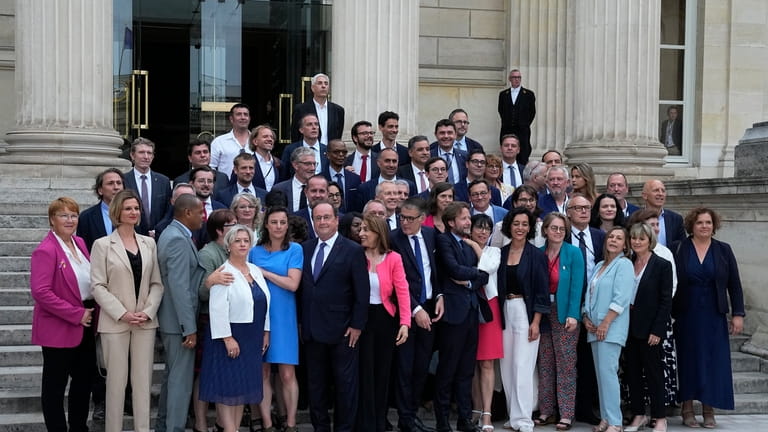 Newly elected parliament members of the Socialist party, with former...