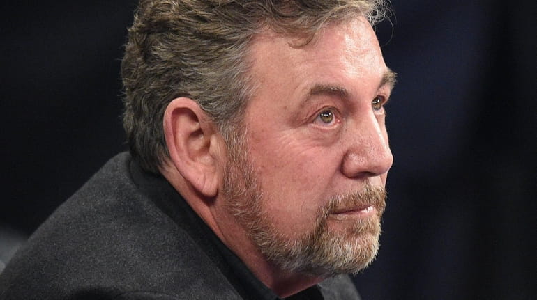 James Dolan looks on before an NBA game between the...