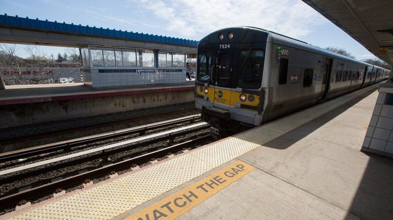 An eastbound train headed for Babylon approaches the Lynbrook LIRR...