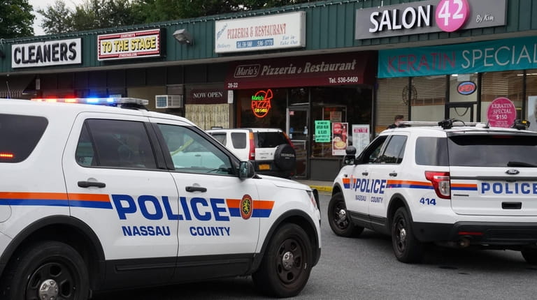 Nassau police on Monday investigate an Oceanside stabbing that killed...