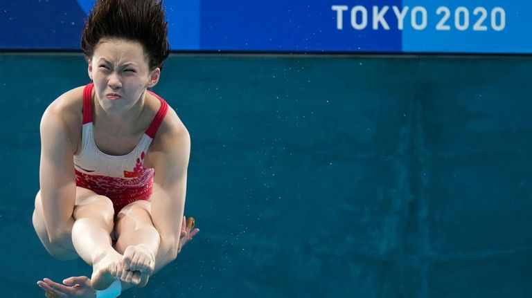 Second placed Chen Yuxi competes in women's diving 10-meter platform...