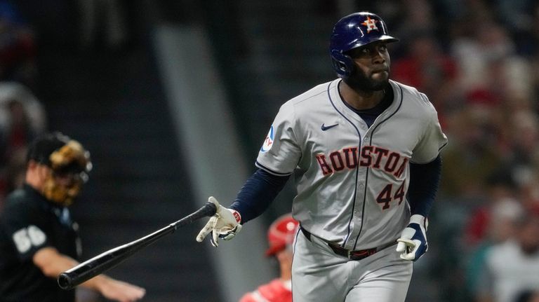 Houston Astros designated hitter Yordan Alvarez runs the bases after...