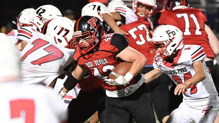 Plainedge's Jake Anglim against Floral Park during a Nassau Conference...