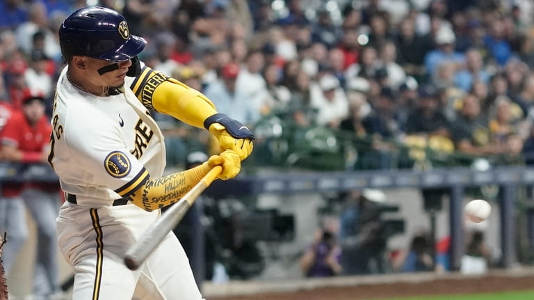 Brewers clinch 3rd NL Central title in 6 seasons despite loss to