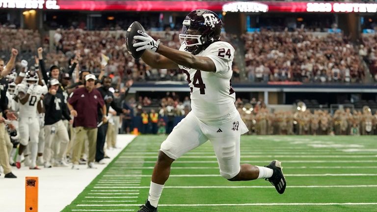 Texas A&M running back Earnest Crownover (24) runs for a...