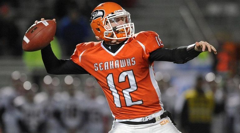 Carey quarterback Mike Catanese throws a pass during a Nassau...