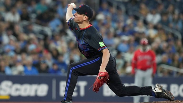 Toronto Blue Jays pitcher Chris Bassitt works against Los Angeles...