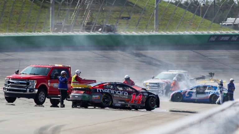 Chase Briscoe (14) is involved in a wreck with Kyle...