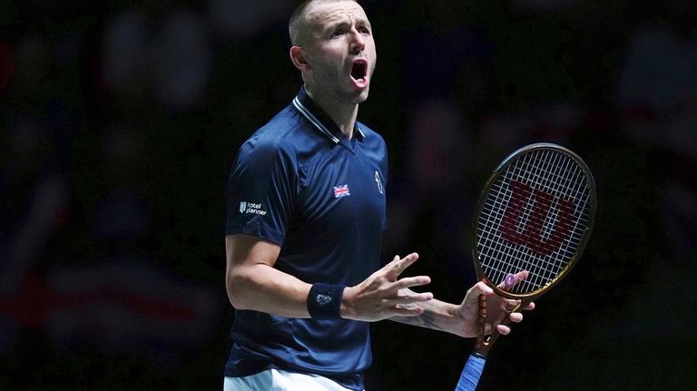 Britain's Dan Evans reacts during the Davis Cup group stage...