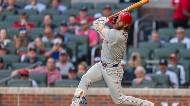 Philadelphia Phillies' Bryce Harper hits a foul ball in the...