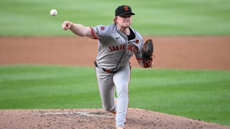 San Francisco Giants starting pitcher Logan Webb throws during the...