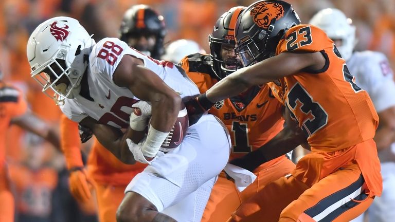 Oregon State's Ryan Cooper Jr. (23) attempts to strip the...