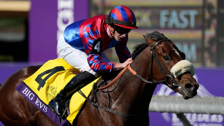 Tom Marquand rides Big Evs to win the Breeders' Cup...