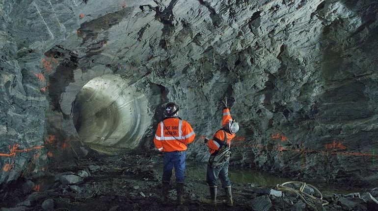 Workers underground in a section of the LIRR's East Side...