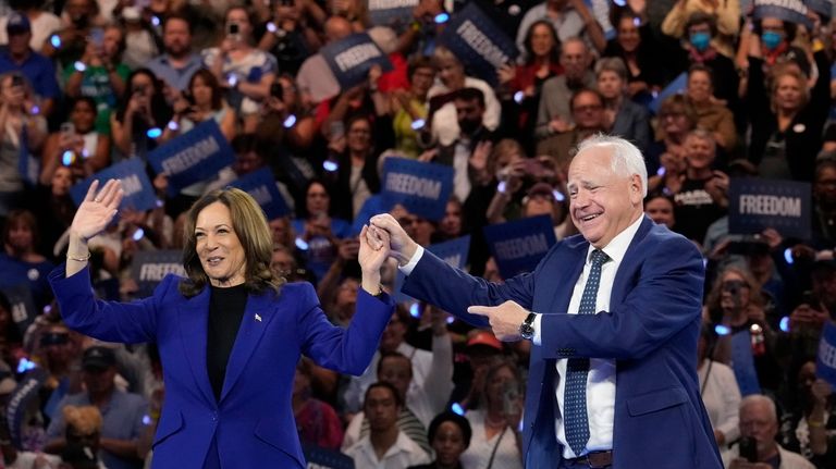 Democratic presidential nominee Vice President Kamala Harris and running mate...