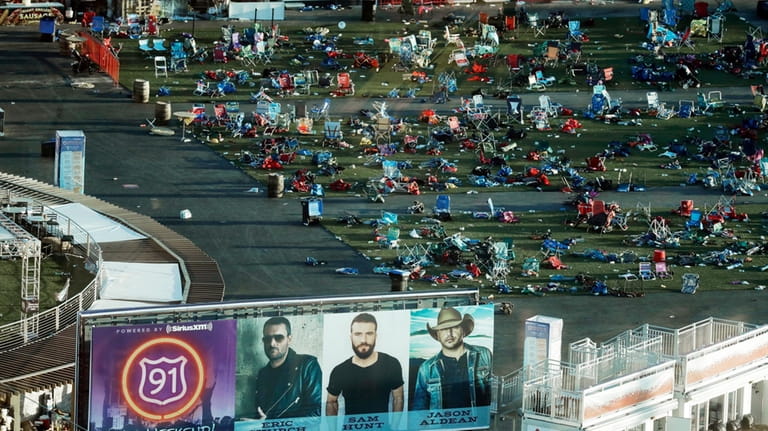 Personal belongings and debris litters the Route 91 Harvest festival...