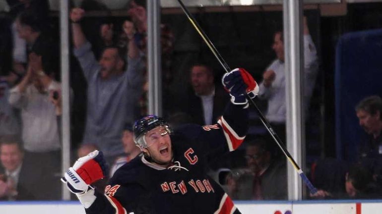 Ryan Callahan celebrates his game winning goal at 2:42 of...