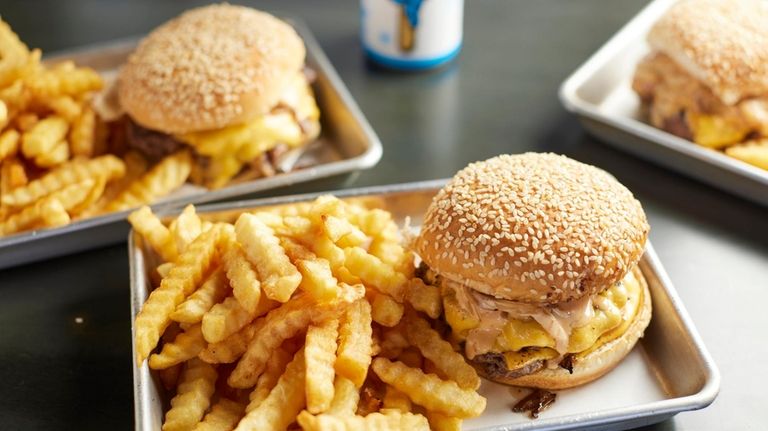 An Oklahoma-style burger with onions at Austin Kitchen in Island...