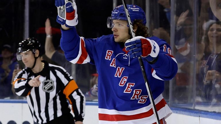 Artemi Panarin of the New York Rangers celebrates his goal...