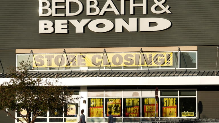 Shoppers enter a Bed Bath & Beyond store Monday, May...