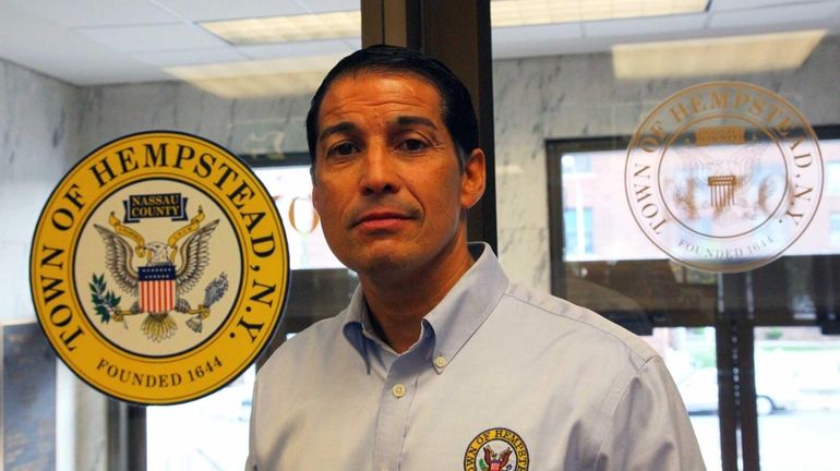 Town of Hempstead Clerk Mark Bonilla stands outside his office...