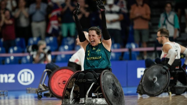 Australia's Ella Sabljak celebrates after winning the wheelchair rugby bronze...