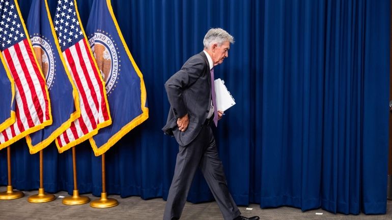 U.S. Federal Reserve Board Chairman Jerome Powell departs after speaking...