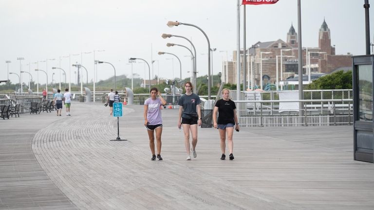 People on the boardwalk in Jones Beach July 2022.