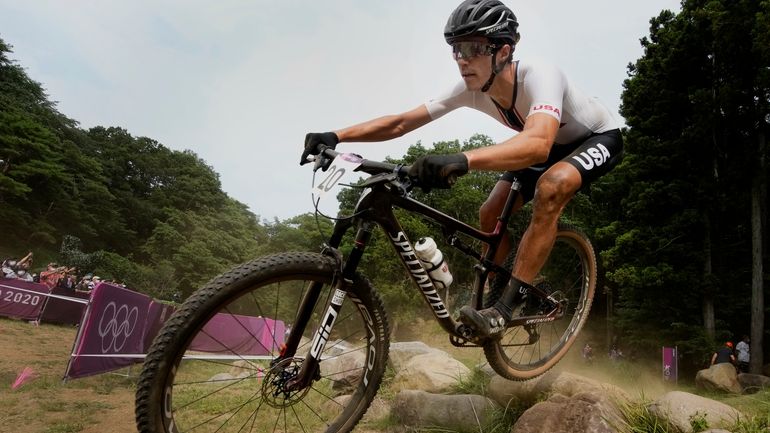 Christopher Blevins of the U.S. competes during the men's cross-country...