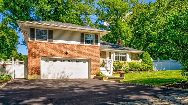 This $849,900 Northport home contains three bedrooms.