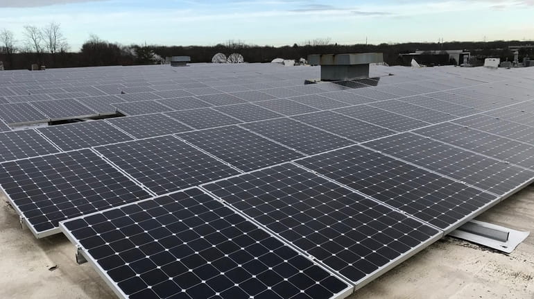 A community solar project atop Long Island Cares food bank...