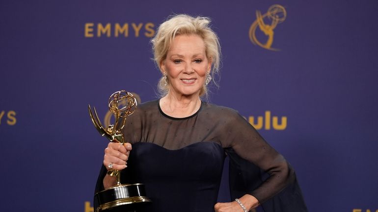 Jean Smart poses in the press room with the award...