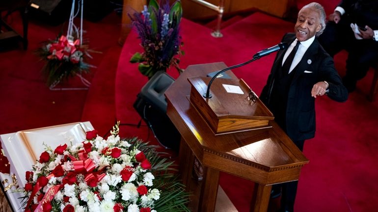 The Rev. Al Sharpton speaks during a funeral service for...