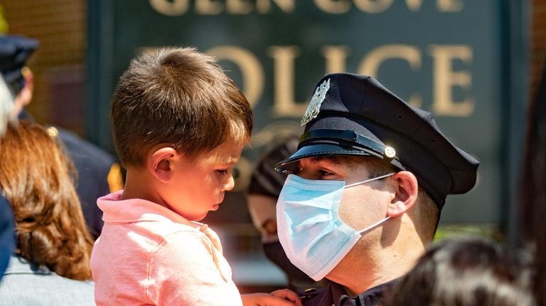 NYPD Officer Michael Ippolito and his son Milo.