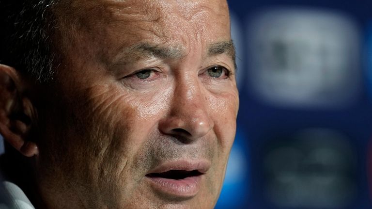 Australia head coach Eddie Jones attends a press conference at...