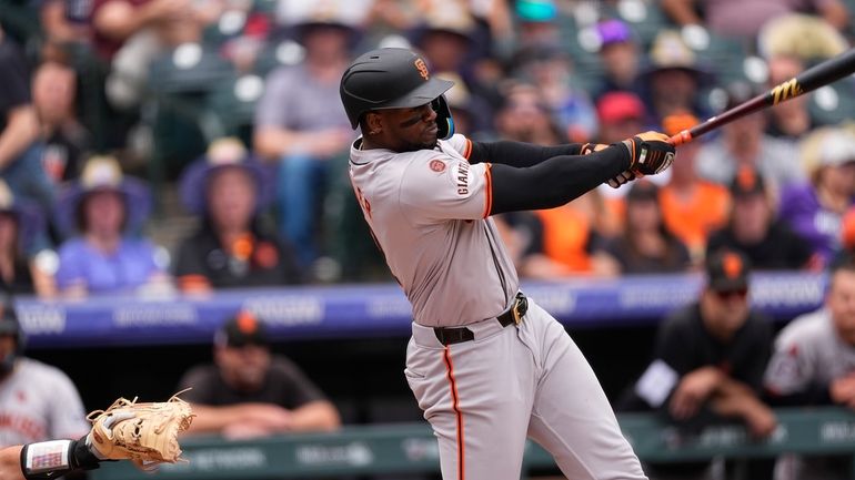 San Francisco Giants' Jorge Soler connects for a solo home...