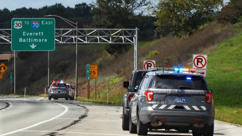 Pennsylvania State troopers pull over vehicles, Sept. 4, 2020, along...