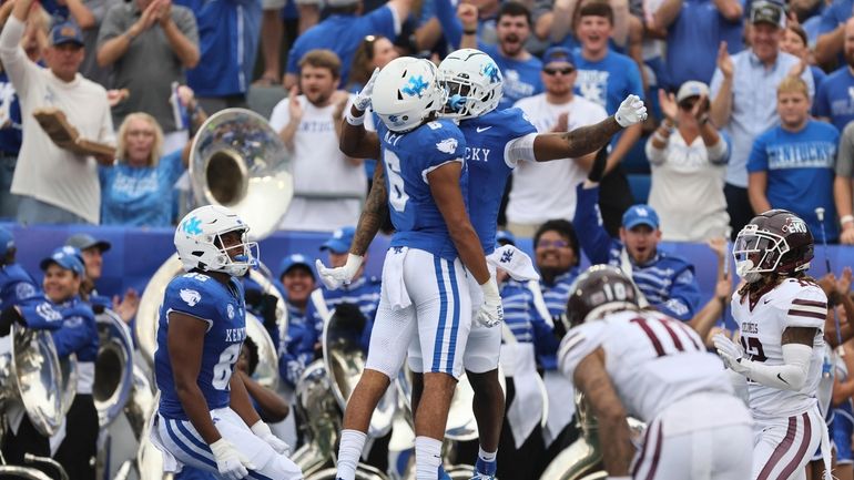 Kentucky wide receiver Dane Key (6) and wide receiver Tayvion...