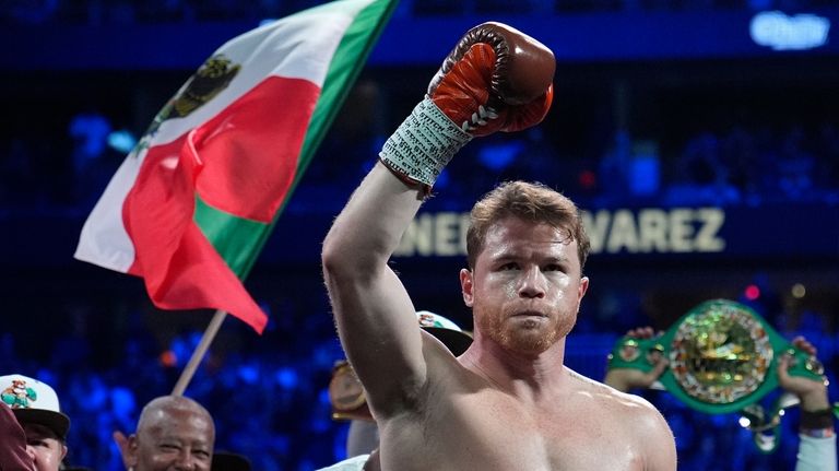 Canelo Alvarez reacts before fighting Edgar Berlanga in a super...