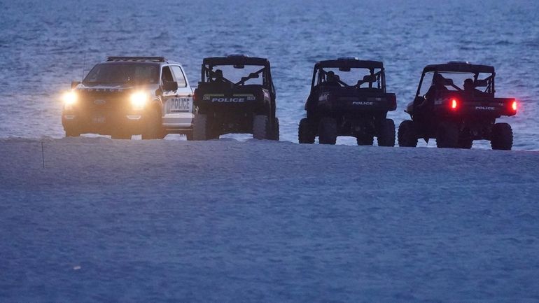 Long Beach City Police on the beach at sunset on June...