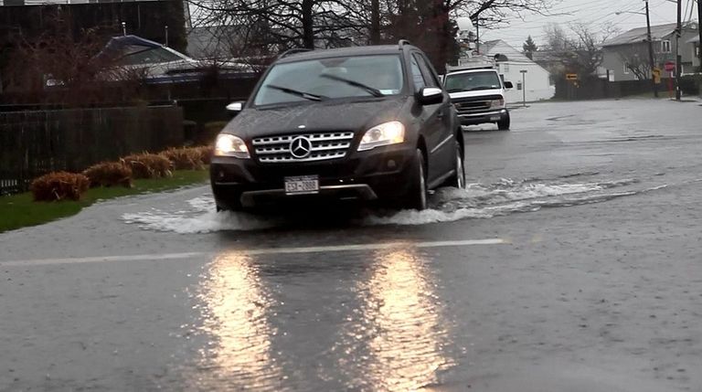 Lindenhurst: Flooded Shore Road on Tuesday, March 30, 2010 in...