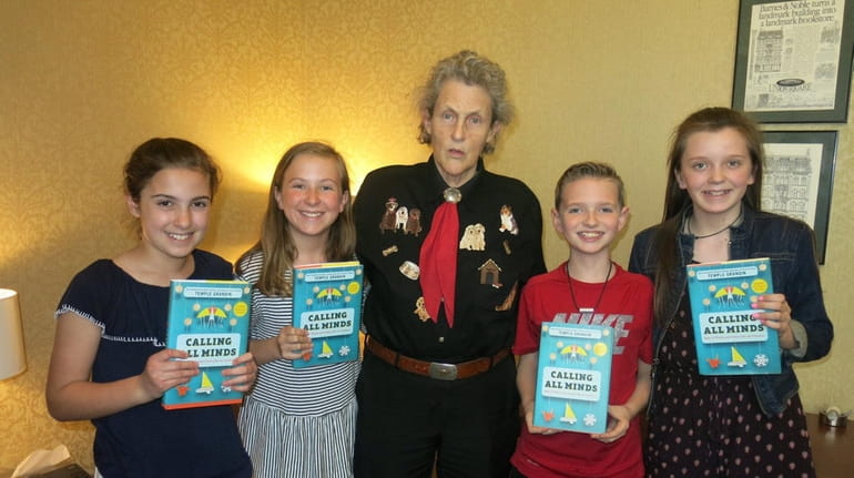 Author Temple Grandin, center, with Kidsday reporters, from left, Kathryn...