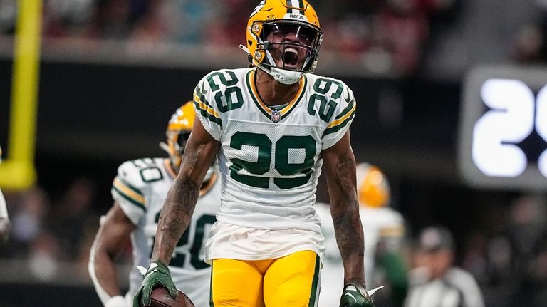 Green Bay Packers cornerback Rasul Douglas (29) celebrates his interception...