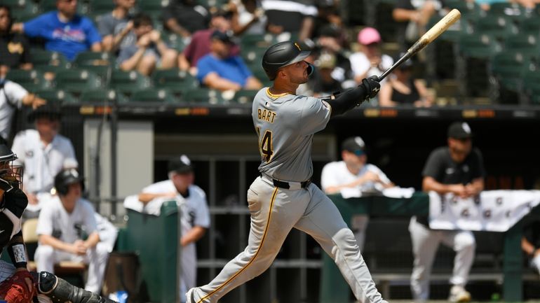 Pittsburgh Pirates' Joey Bart watches his three-run home run during...