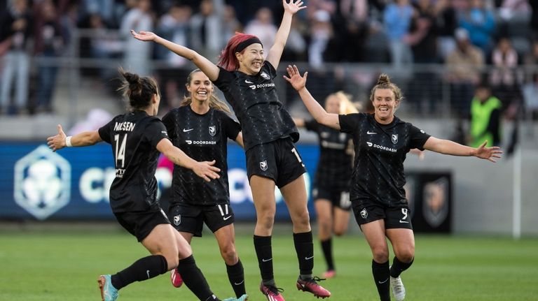 Angel City FC forward Jun Endo, center, celebrates her canceled...