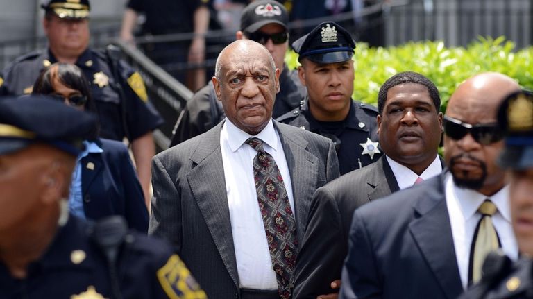 Bill Cosby leaves a preliminary hearing on sexual assault charges...