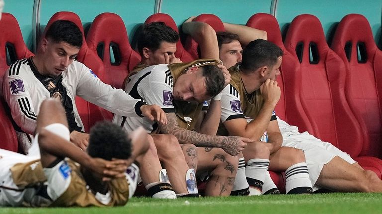 German subs on the bench react after the World Cup...