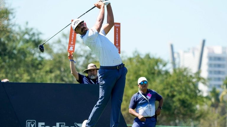 Erik van Rooyen, of South Africa, watches his tee shot...