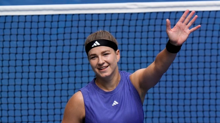 Karolina Muchova, of the Czech Republic, reacts after defeating Jasmine...