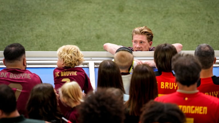 Belgium's Kevin De Bruyne is dejected at the end of...